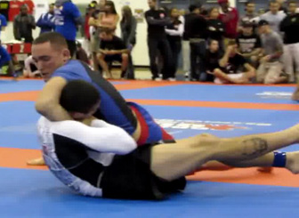 Devin Genchi tapping out Black Belt Joao Moncaio in the Finals - at the time Devin was only a blue belt.